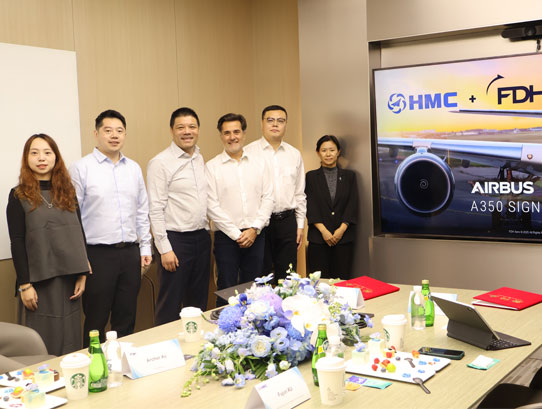 Cody Ho and Pierre Jacquet Francillo signing supply agreement.