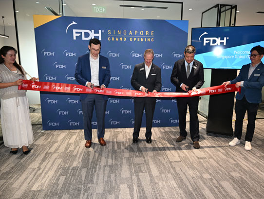 Ribbon cutting ceremony for FDH Aero's Singapore COE grand opening.